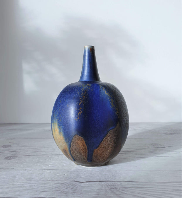 AnyesAttic Porcelain Reiner Gehrig, Grünstadt Studio, Matte Cedar, Sand and Blue Running Glaze Bottle Vase | 1970s