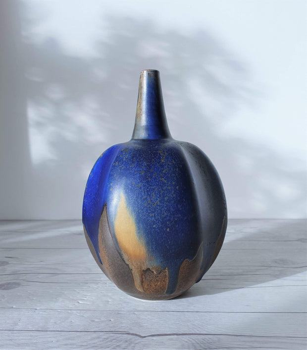 AnyesAttic Porcelain Reiner Gehrig, Grünstadt Studio, Matte Cedar, Sand and Blue Running Glaze Bottle Vase | 1970s