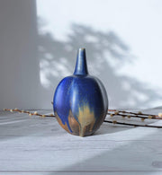 AnyesAttic Porcelain Reiner Gehrig, Grünstadt Studio, Matte Cedar, Sand and Blue Running Glaze Bottle Vase | 1970s