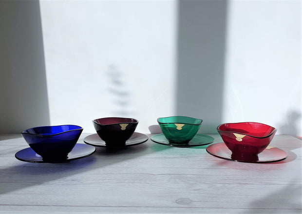 https://hautecurature.com/cdn/shop/products/anyesattic-glass-swedish-gullaskruf-4-colour-dot-relief-glass-bowl-and-saucer-set-for-4-and-serving-bowl-1960s-70s-15470389755973_620x.jpg?v=1613891094