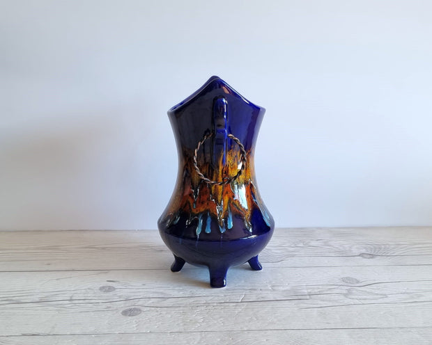 https://hautecurature.com/cdn/shop/products/bertoncello-ceramiche-ceramic-bertoncello-ceramiche-trailed-glaze-in-midnight-fire-palette-mid-mod-sculptural-cachepot-vase-italian-1970s-80s-31746833711173_620x.jpg?v=1663102930