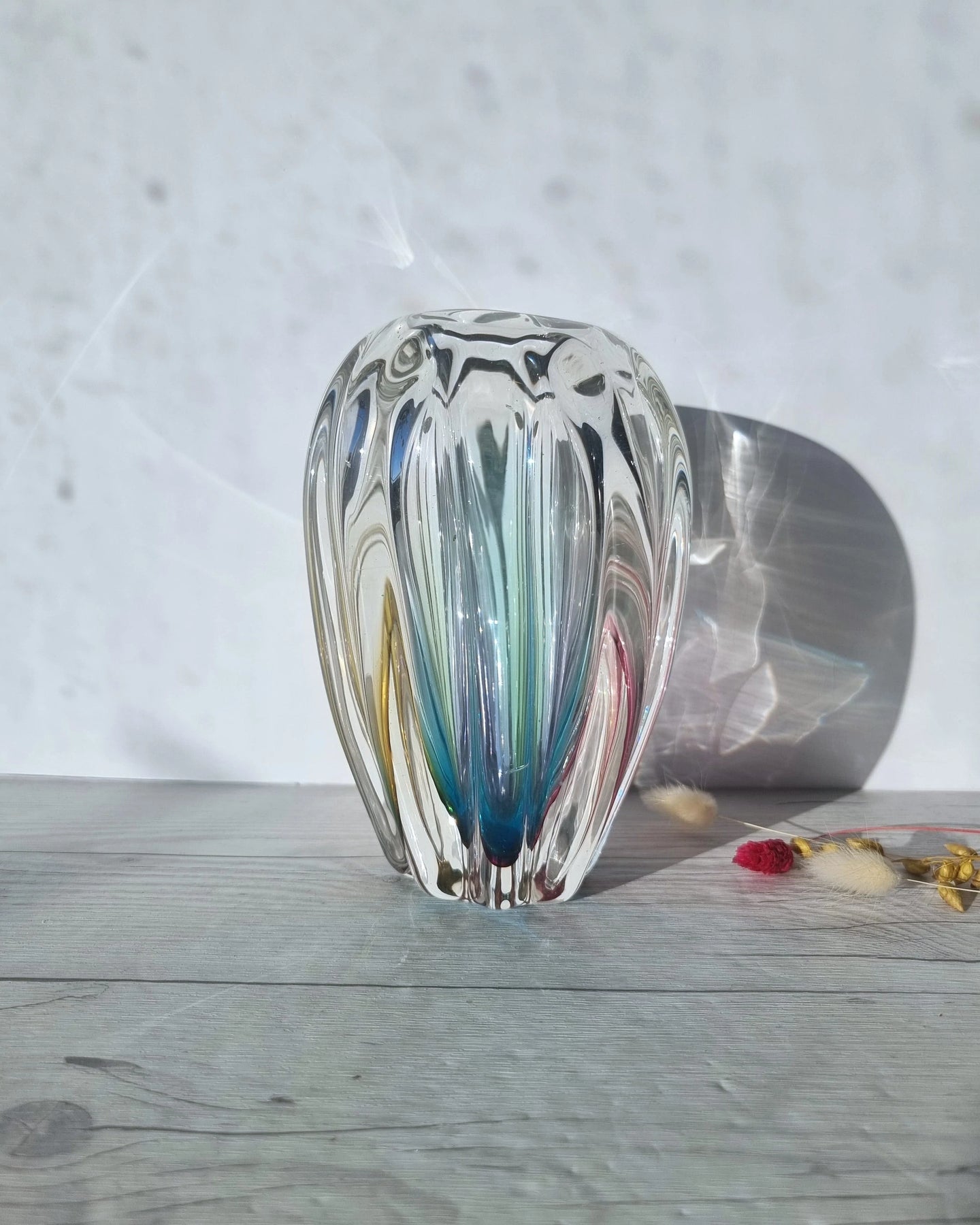 https://hautecurature.com/cdn/shop/products/narumi-glass-glass-sanyu-glassworks-narumi-fantasy-series-rainbow-sommerso-abstract-cacao-pod-vase-60s-70s-labelled-40148027212053_1800x1800.webp?v=1672865575