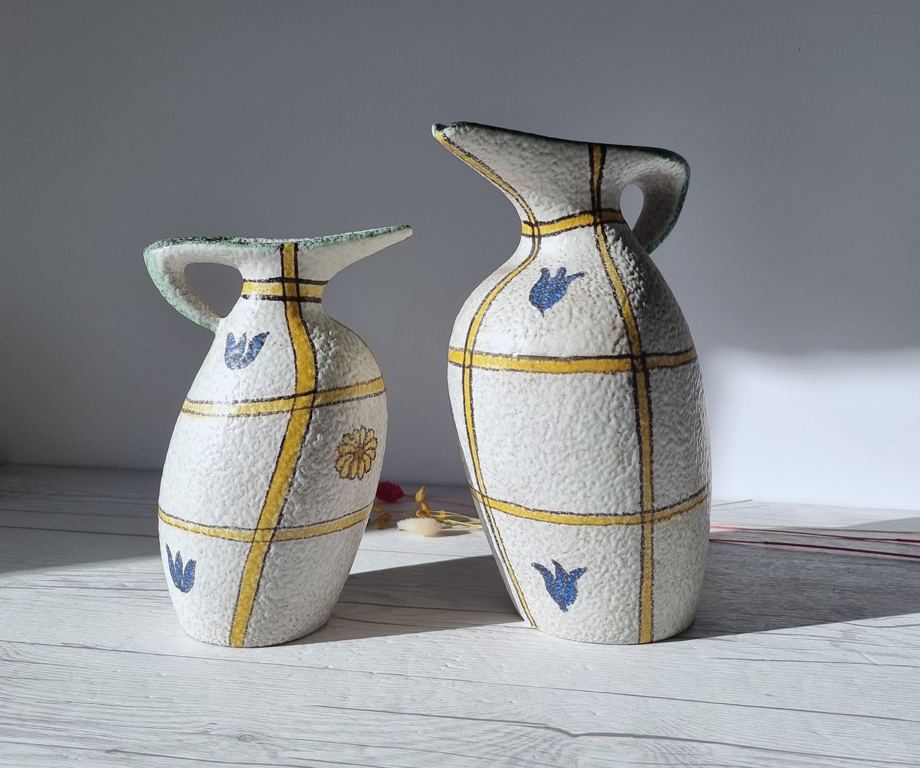 https://hautecurature.com/cdn/shop/products/ruscha-ceramic-pair-of-kurt-tschorner-for-ruscha-keramik-sculptural-abstract-321-jug-vases-1960s-70s-wgp-40582211109141_1800x1800.jpg?v=1677938508